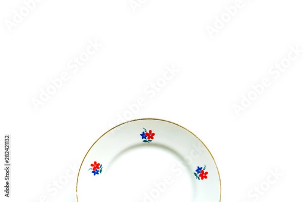 Obraz simple old fashioned vintage plate on a white background.