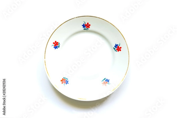 Obraz simple old fashioned vintage plate on a white background.