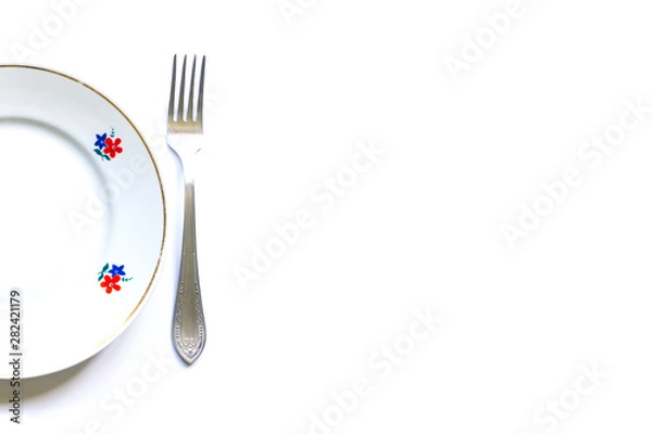 Obraz designer fragments of the served table for eating. Fork, spoon and plate - simple breakfast, lunch or dinner.
