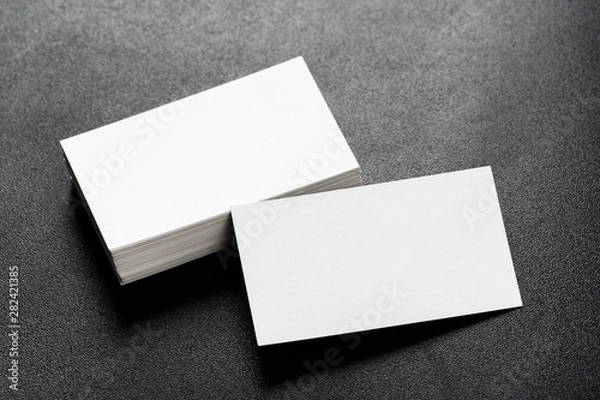 Obraz Mockup of business cards stack at dark background. Design concept. Template for branding identity.