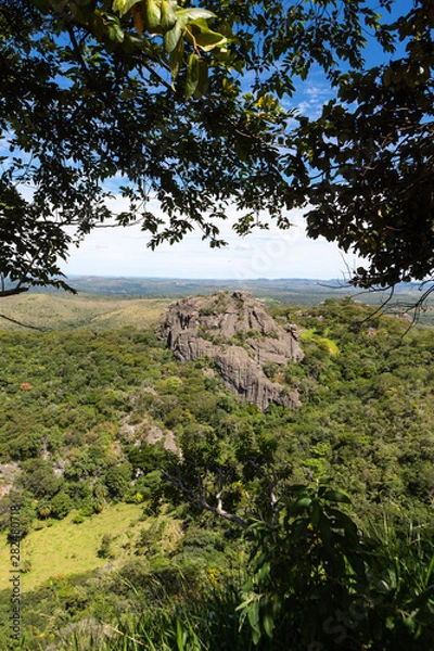 Fototapeta Beautiful aerial view of Serra do Cipo in Minas Gerais with forests and rock mountains in sunny summer day with blue sky. Landscape of the Brazilian Cerrado, one of the most devastated biomes.