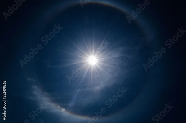 Obraz Halo in the blue sky around the sun