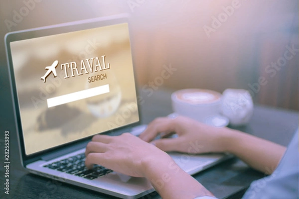Fototapeta Travel concept, best opportunities on the screen of laptop online