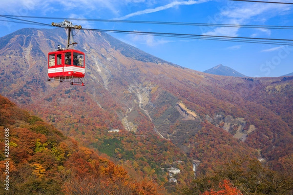 Obraz Cable car with leaves turning color on high mountain in Akechidaira Ropeway Station - Nikko, Japan