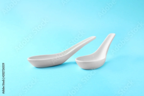 Fototapeta Clean Miso soup spoons on blue background