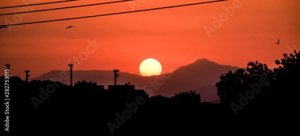 Fototapeta Sunset above mountains