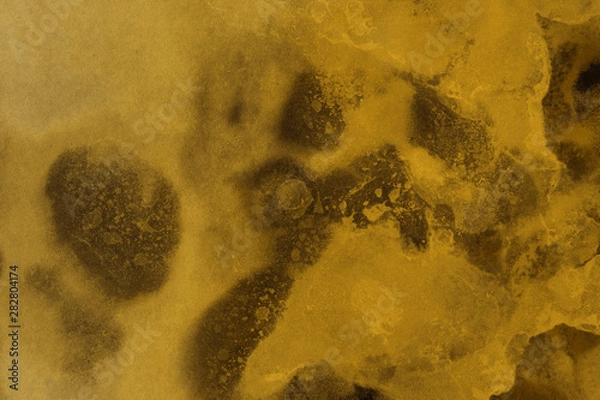 Fototapeta Hand painted gold alcohol ink background. Abstract delicate yellow texture. Contemporary wallpaper. 