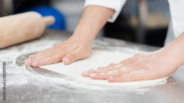 Obraz Rolling Pin on Floured Background pizza making