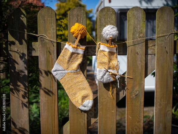 Obraz Stricksocken mit Wollknäul