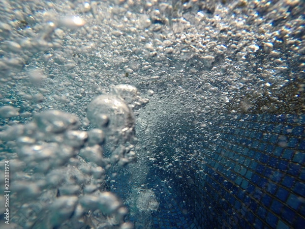 Fototapeta selective focus bubble under water in the pool.