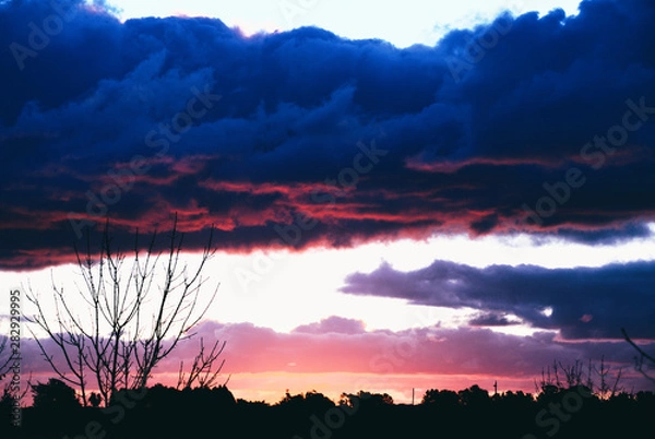 Obraz Clouds at dusk in winter.