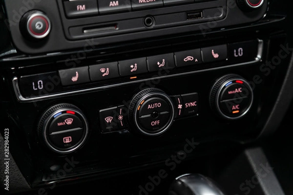 Fototapeta Close up car ventilation system and air conditioning - details and controls of modern car..