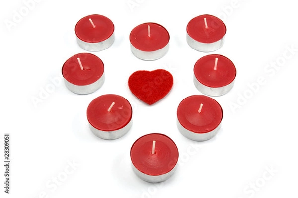 Fototapeta heart shape made from red candles. isolated on white