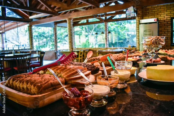 Obraz colonial breakfast in a hostel farm