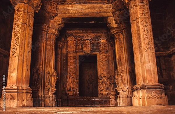 Fototapeta Carvings and reliefs inside sacred Hindu temple in Khajuraho, India. Artworks, columns and altar in the 10th century indian temple