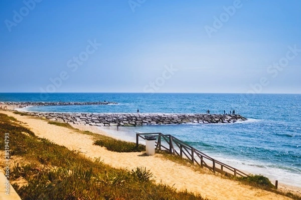 Obraz Figueira da foz beach Portugal. Summer day in Europe. Boho style coloured style photo.  Over processed.