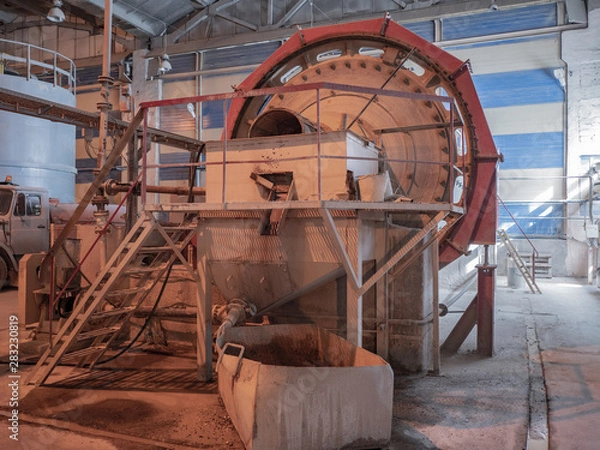 Fototapeta Plant for production of aerated concrete building blocks according to German technology..Equipment supplied by German company. Pipe, mixing drums, drying chambers, conveyors for moving