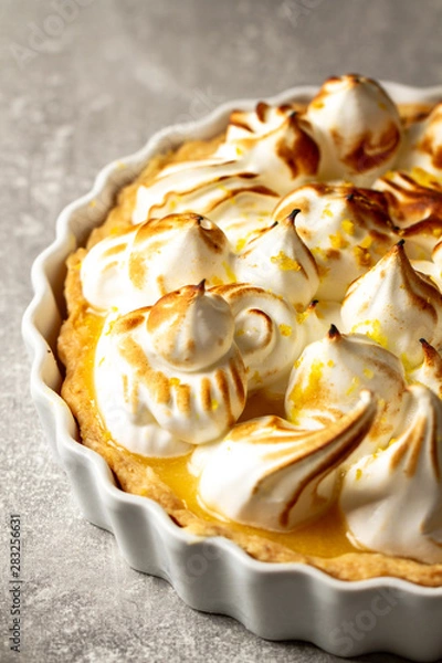 Fototapeta Lemon tart with meringue on table. Sweet lemon dessert.