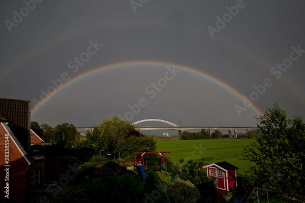 Obraz Regenbogen über der Störbrücke