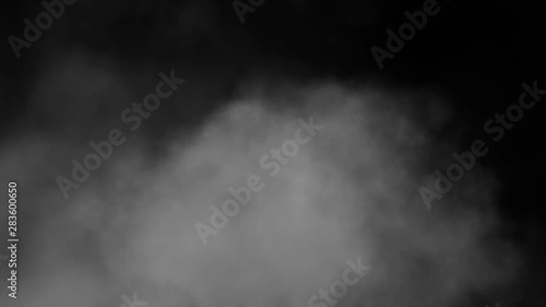 Fototapeta Close up of steam smoke on black background. Smoke stock image.Smoke cloud. Fog clouds, smoky mist and realistic cloudy effect. Condensation smoke effects, ashes mist texture or toxic gas.