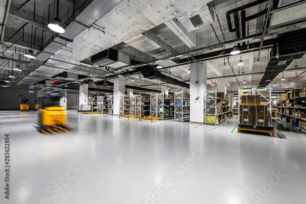 Fototapeta Modern automation of warehouse production in China.