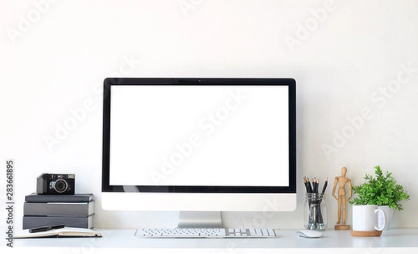 Fototapeta Workspace desk and laptop. copy space and blank screen. Business image, Blank screen laptop and supplies.