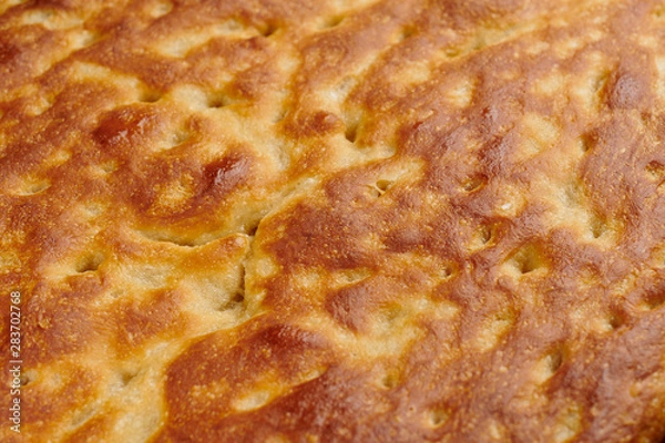 Fototapeta Italian focaccia bread on a baking tray