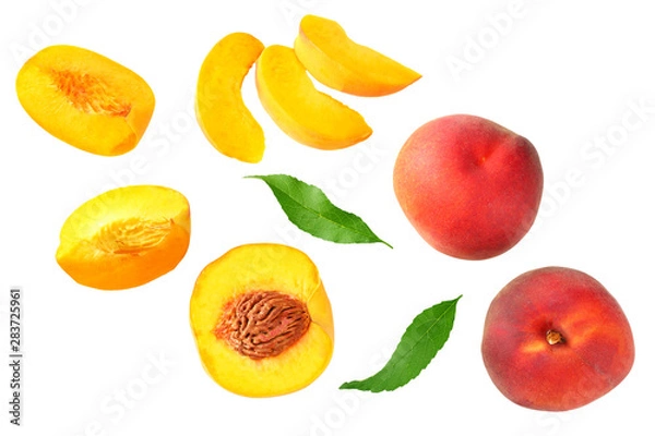 Fototapeta peach fruit with green leaf and slices isolated on white background. top view