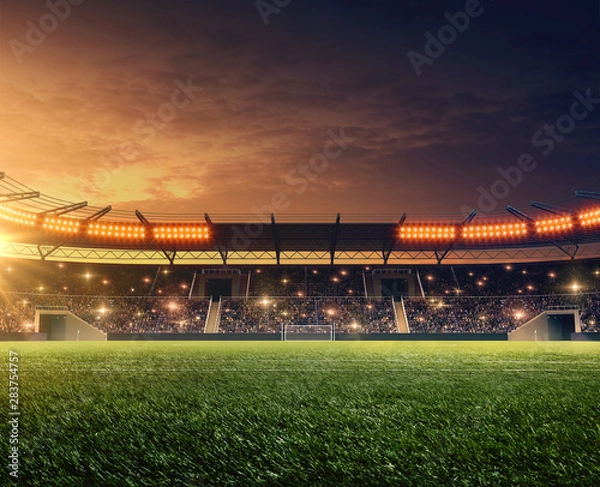 Obraz Soccer stadium with tribunes, cheering fans and dramatic night sky. 