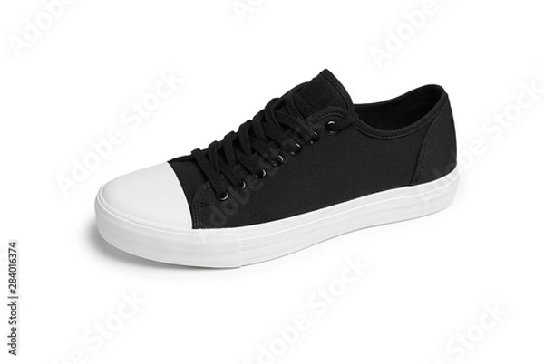 Obraz Classic sneakers on a white background side view.