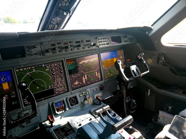 Obraz Bussenes jet airplane cockpit Flight Deck.Instrument panel.
