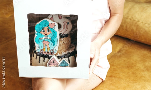 Fototapeta Brest, Belarus - August 10, 2019: Hairdorables birthday cake for girls.