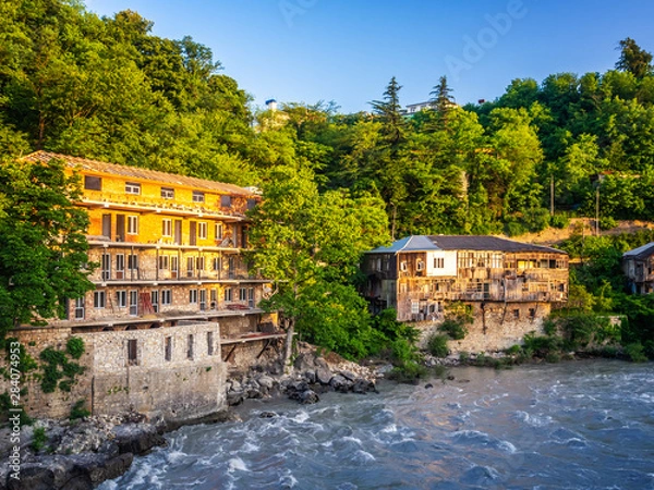 Obraz Old buildings at the bank of Rioni river in Kutaisi, Georgia