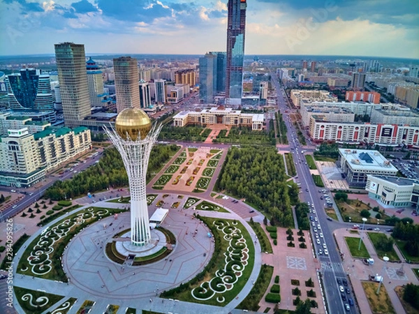 Obraz NUR-SULTAN, KAZAKHSTAN (QAZAQSTAN) - July 29, 2019: Beautiful panoramic aerial drone view to Nursultan (Astana) city center with skyscrapers and Baiterek Tower - symbol of Kazakh people freedom