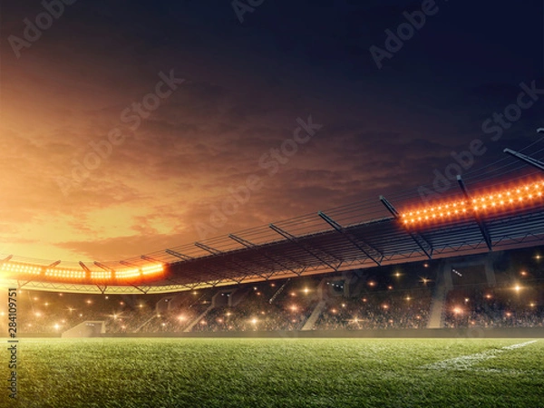 Obraz Soccer stadium with illuminated tribunes. Sports event. Night  dramatic sky.