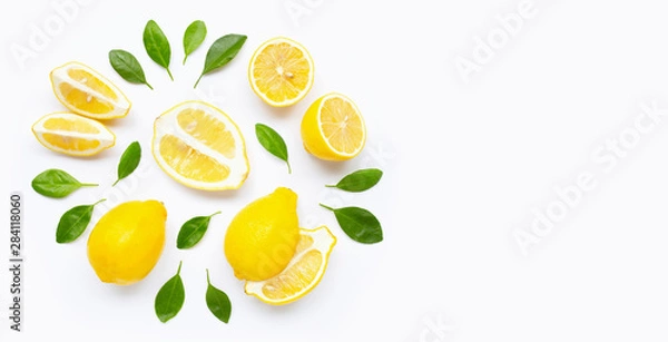 Fototapeta Fresh lemon and  slices with leaves isolated on white