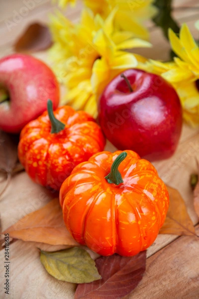 Obraz Happy Thanksgiving concept. Closeup of pumpkin, candle light and apple