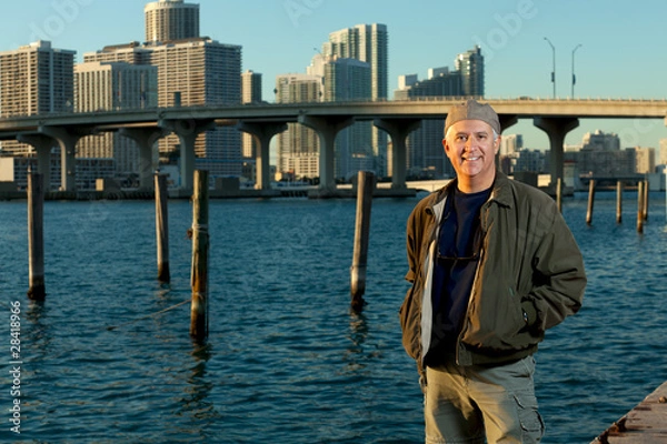 Fototapeta Handsome middle age man in an urban lifestyle pose