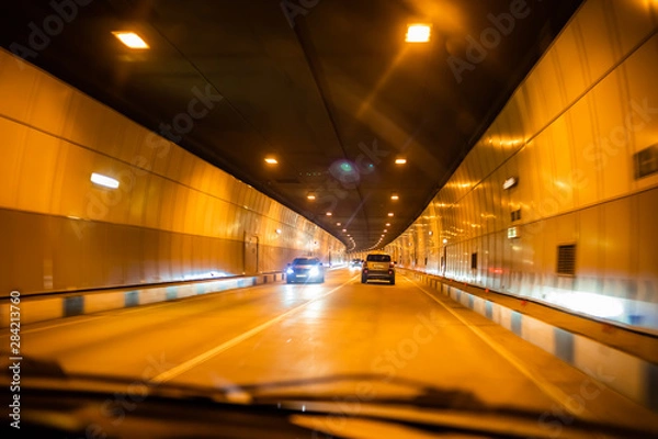 Fototapeta by car into the tunnel
