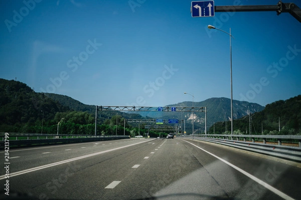 Fototapeta on the way to the mountains the road