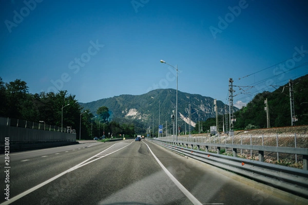 Fototapeta on the way to the mountains the road