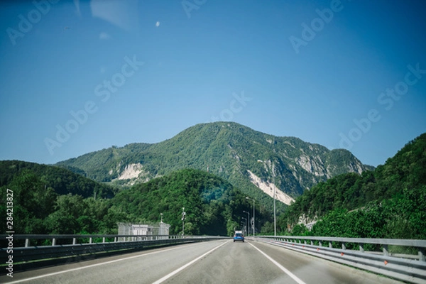 Fototapeta on the way to the mountains the road
