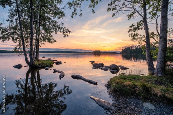 Obraz Idyllic landscape with beautiful sunset and tranquil mood at summer evening in Loppi, Finland