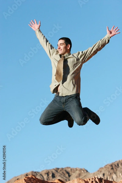 Fototapeta ecstatic businessman jumping