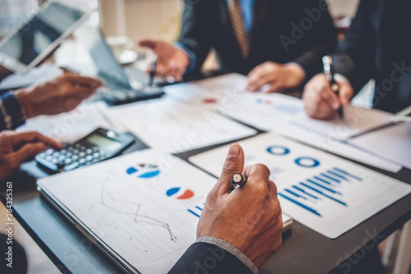 Fototapeta Business Corporate team brainstorming with chart and checking and analysis