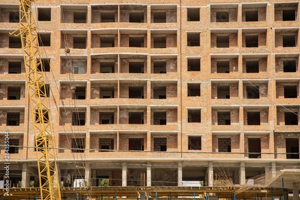 Fototapeta brick building frame construction process simple background concept picture 