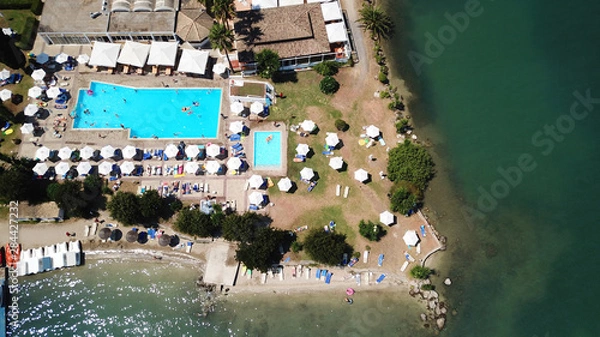 Obraz Aerial drone photo of resort near famous tropical bay of Nisaki a popular yacht dock, island of Corfu, Ionian, Greece