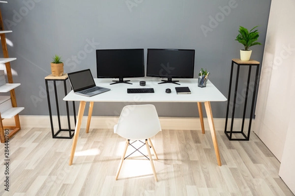Fototapeta Computer On Desk In Modern Office