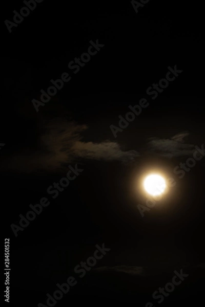 Fototapeta Moon light behind cloud