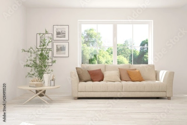 Fototapeta Stylish room in white color with sofa and summer landscape in window. Scandinavian interior design. 3D illustration